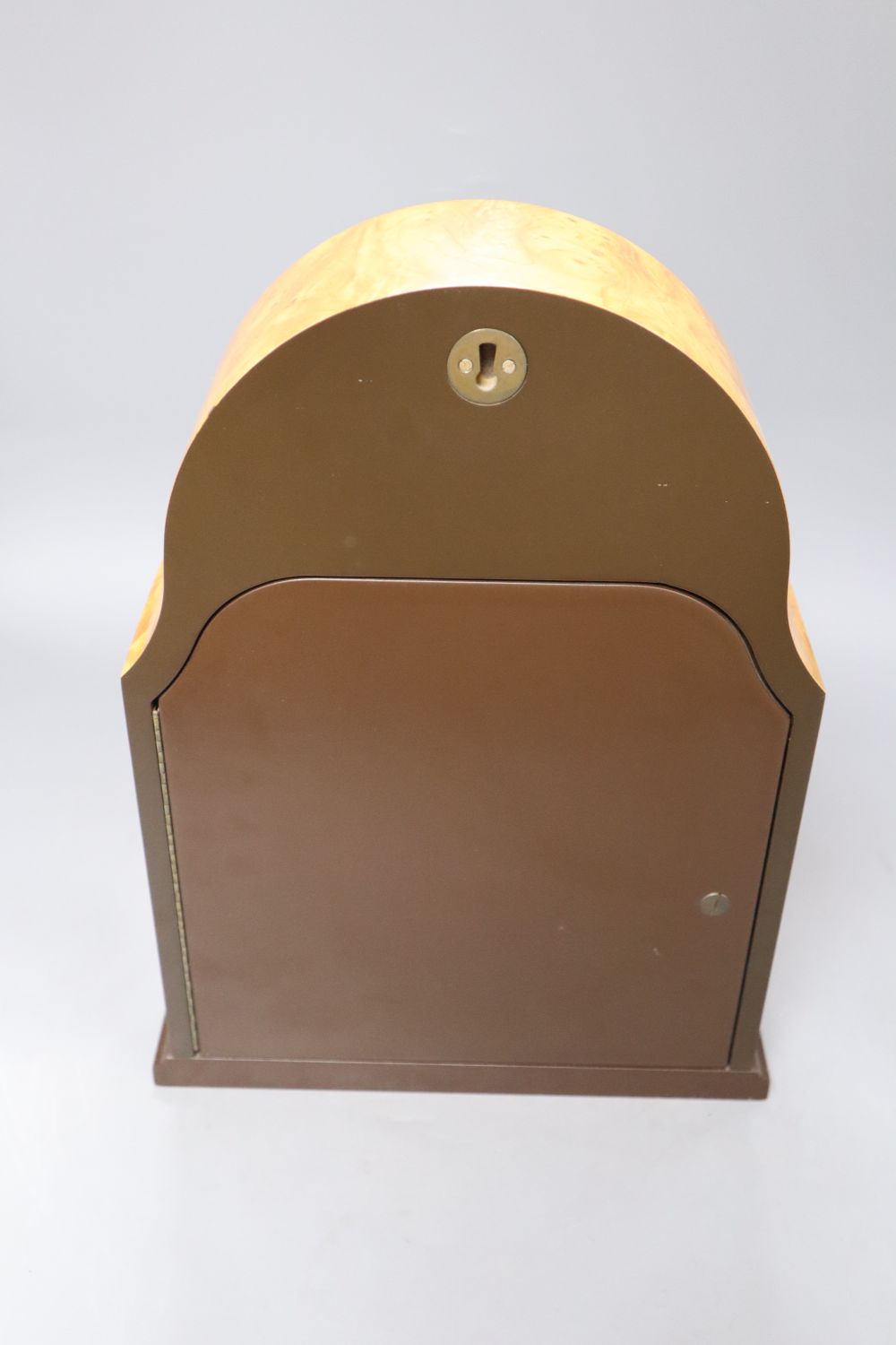 A Victorian style maple mantel clock